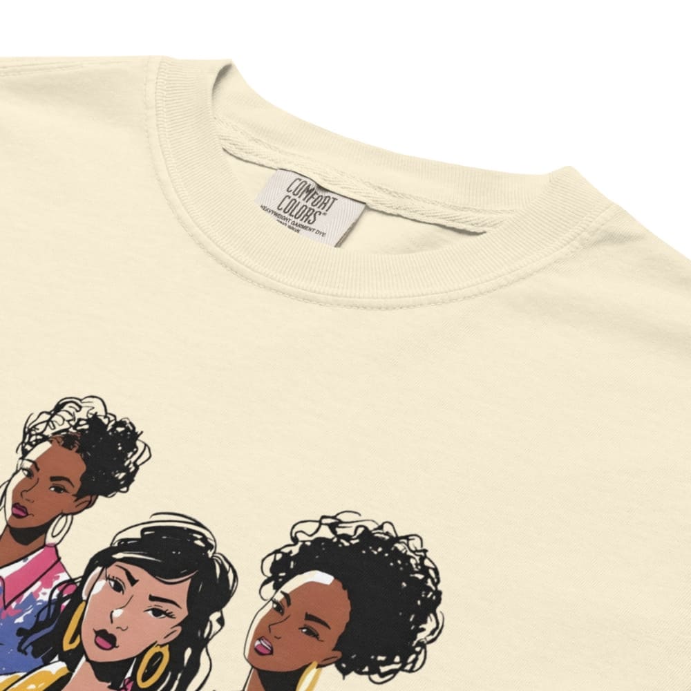 Beige t-shirt with illustrations of three women on a white background