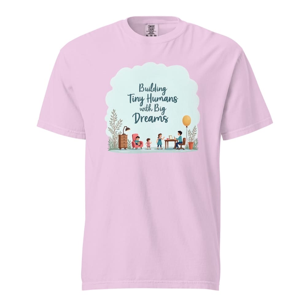 Illustrated t-shirt design with the quote "Building Tiny Humans with Big Dreams" surrounded by a family parenting scene