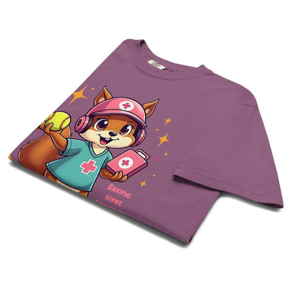 Cute cartoon nurse squirrel in scrubs and cap holding a softball and first aid kit with quote “Saving Lives Between Innings” – printed on garment-dyed heavyweight cotton shirt for nurse softball moms