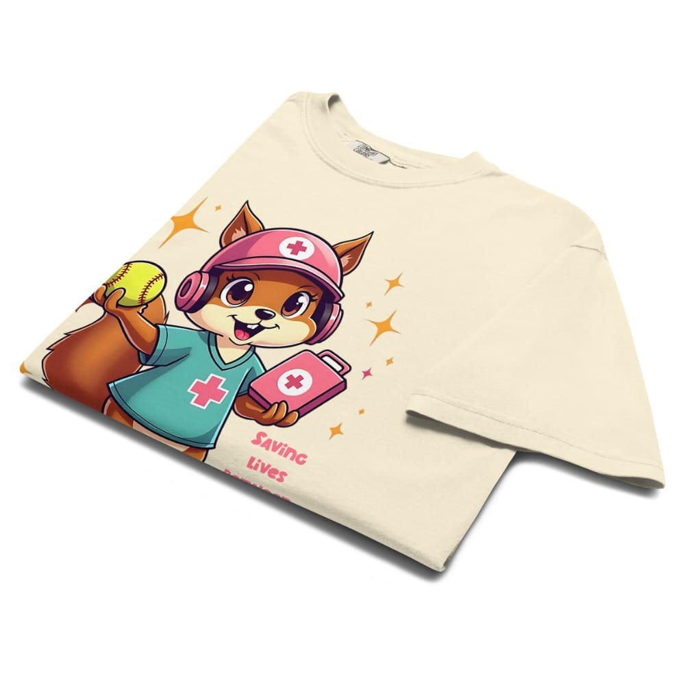 Cute squirrel nurse cartoon in scrubs, pink cap, and headset holding a softball and medical kit with the phrase “Saving Lives Between Innings” — printed on a heavyweight cotton t-shirt