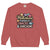 Sweatshirt design with text “Motherhood. Powered by Snacks & Sarcasm.” featuring colorful macarons and a steaming coffee cup on vintage-washed cotton fleece.
