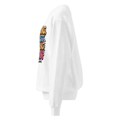 White sweatshirt with colorful text design on a white background
