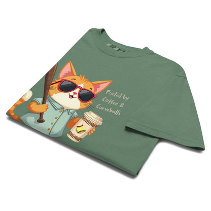 Cool cat with sunglasses holding a softball bat and coffee cup, beside text “Fueled by Coffee & Curveballs” – printed on soft heavyweight t-shirt for sporty moms