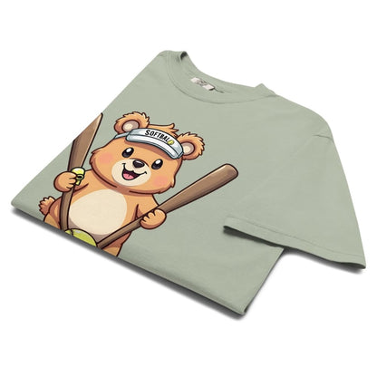Cartoon bear holding softball bats and ball wearing a visor labeled “Softball” – printed on garment-dyed heavyweight t-shirt for sporty moms
