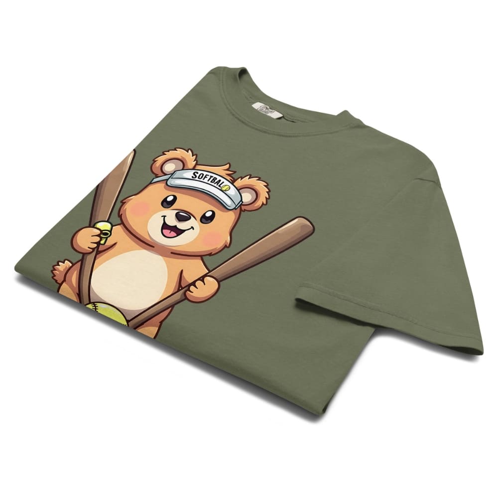 Cartoon bear holding softball bats and ball wearing a visor labeled “Softball” – printed on garment-dyed heavyweight t-shirt for sporty moms