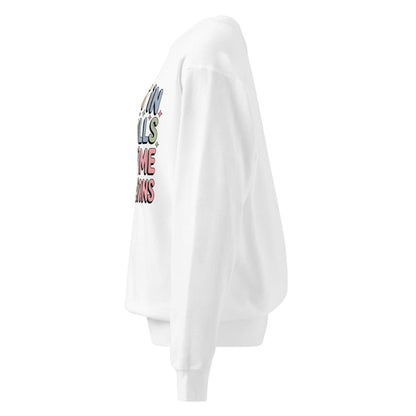 White sweatshirt with colorful text on the sleeve against a white background