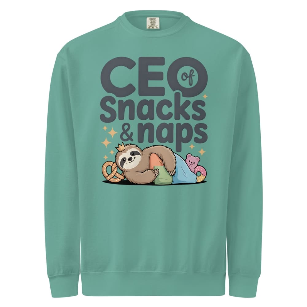 "CEO of Snacks & Naps" printed sweatshirt featuring a sloth in a crown surrounded by pretzels and plushies on vintage-washed cotton fleece