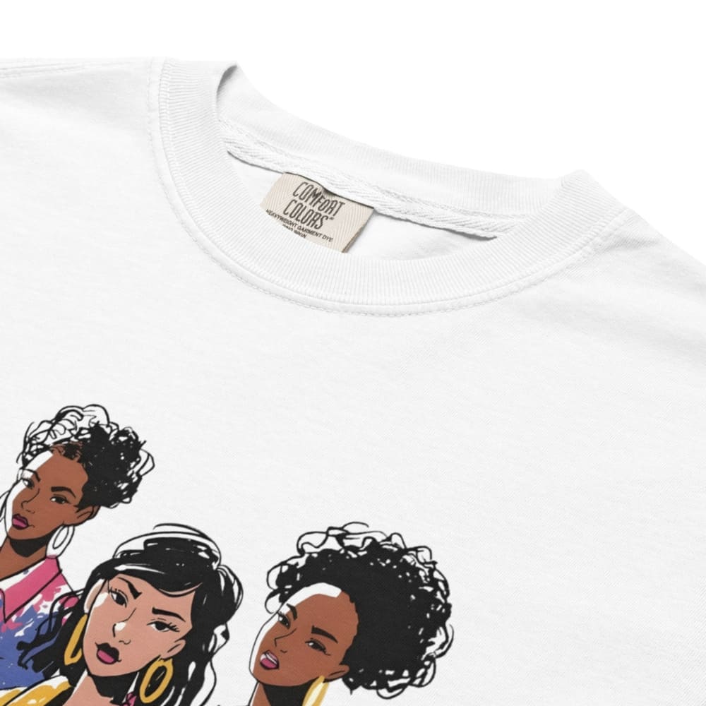White t-shirt with illustrations of three women with natural hair and 'Comfort Colors' label.