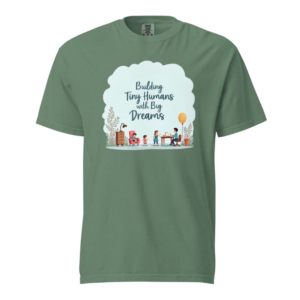 Illustrated t-shirt design with the quote "Building Tiny Humans with Big Dreams" surrounded by a family parenting scene