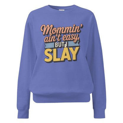“Mommin' Ain’t Easy But I Slay” retro-style DTG printed design in peach, blue, and yellow on vintage garment-dyed fleece sweatshirt