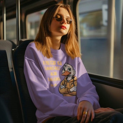 Person wearing a purple sweatshirt with a cartoon character on a bus
