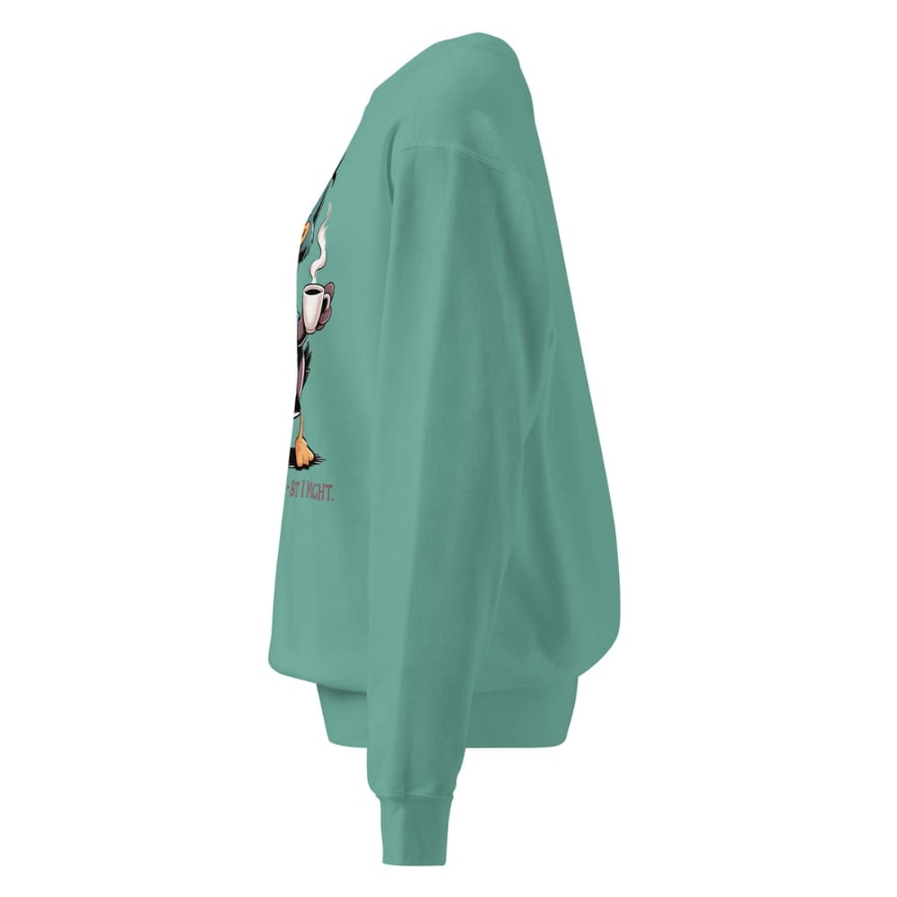 Green sweatshirt with a graphic design on the sleeve against a white background