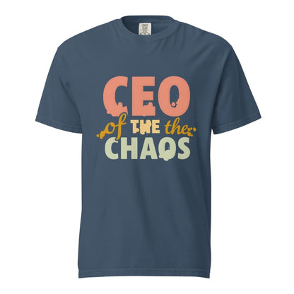 CEO of the Chaos” printed on a heavyweight cotton t-shirt in soft pastel ink, laid flat with a minimal lifestyle background.