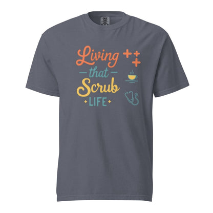 “Living That Scrub Life” colorful text printed on a garment-dyed cotton t-shirt for nurses and healthcare professionals