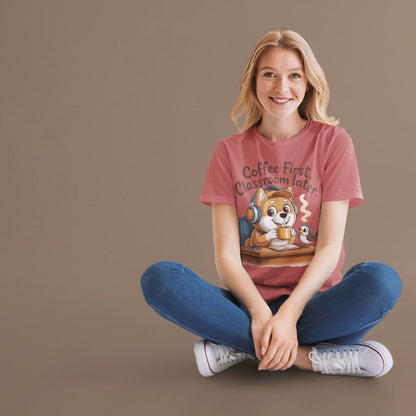 Person wearing a red t-shirt with a graphic design sitting on a brown background