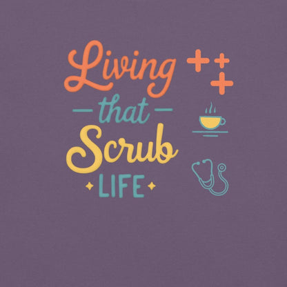“Living That Scrub Life” colorful text printed on a garment-dyed cotton t-shirt for nurses and healthcare professionals