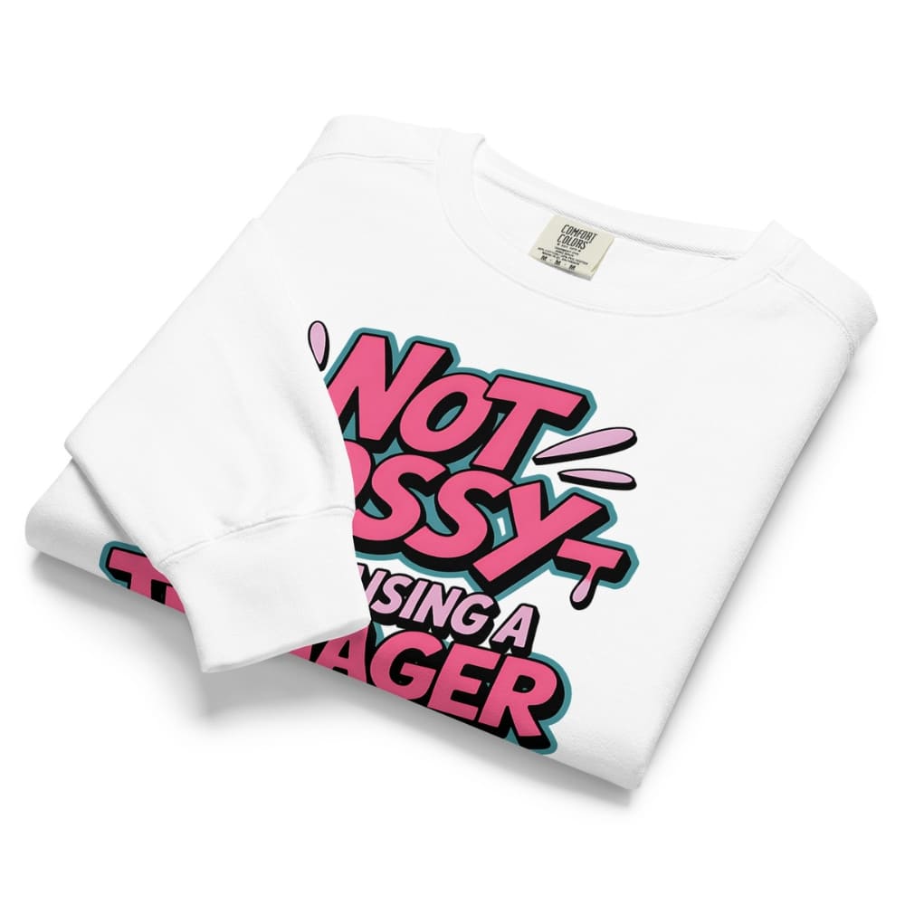 White t-shirt with pink and black text design on a white background