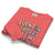 Folded pink sweatshirt with colorful text design on a white background