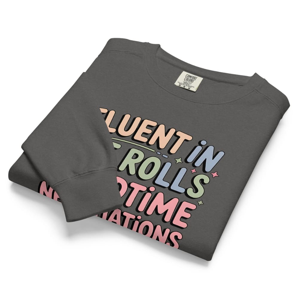 Folded gray sweatshirt with colorful text design on a white background