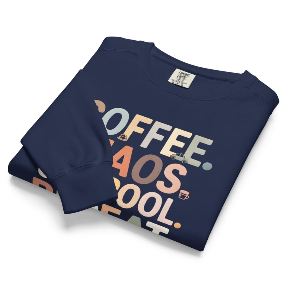 Folded navy blue sweatshirt with colorful text design on a white background