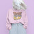 “Mommin' Ain’t Easy But I Slay” retro-style DTG printed design in peach, blue, and yellow on vintage garment-dyed fleece sweatshirt