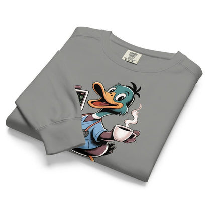 Folded gray sweatshirt with cartoon character holding a coffee cup on a white background