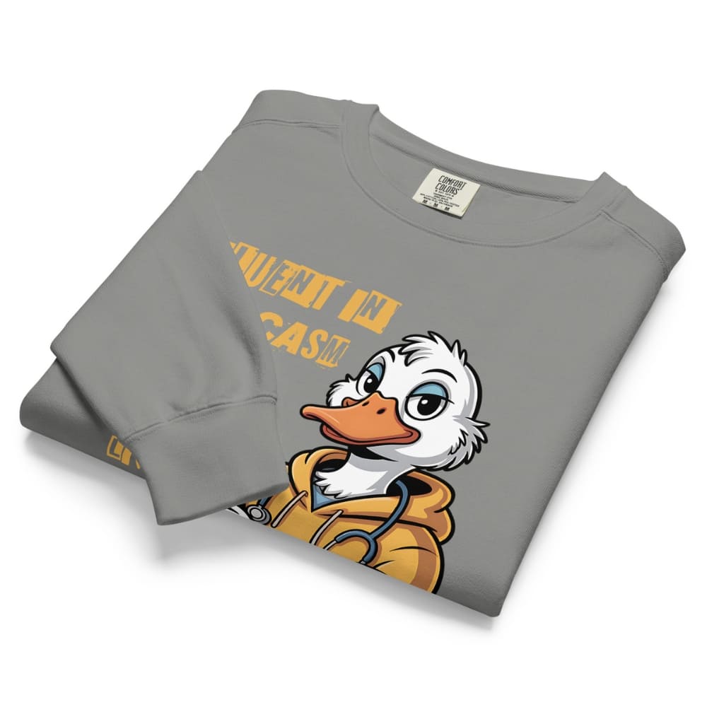 Folded gray sweatshirt with cartoon duck character and text on a white background