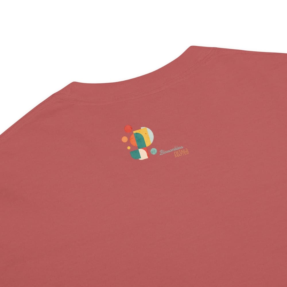 Red t-shirt with a colorful logo on a white background