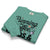Folded teal sweatshirt with text and graphics on a white background