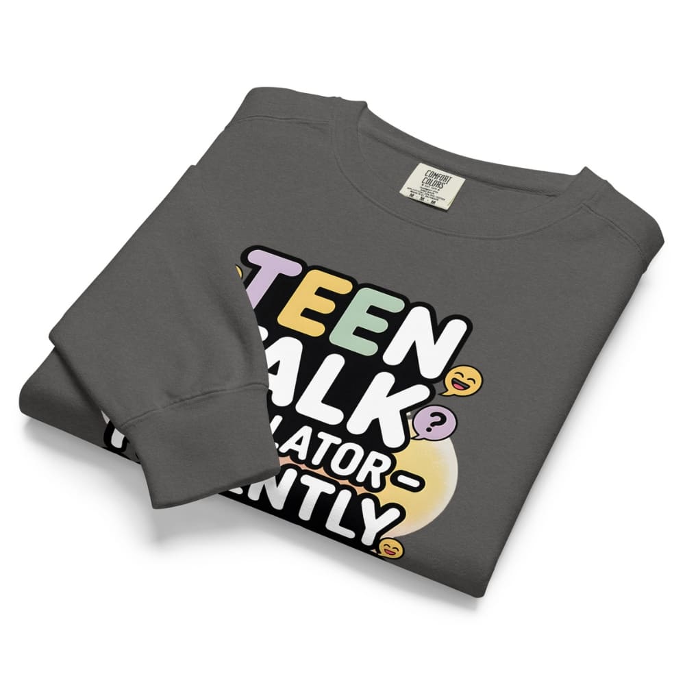 Folded gray sweatshirt with colorful text design on a white background