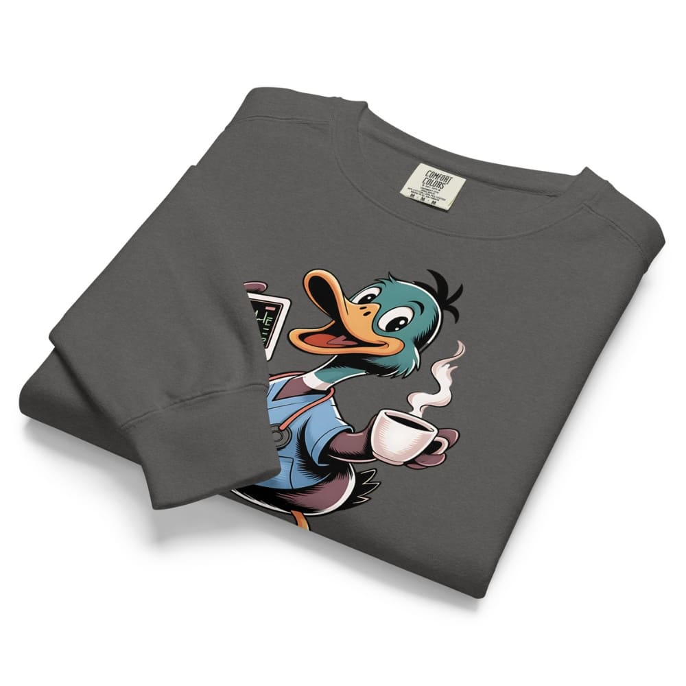Folded gray sweatshirt with a cartoon duck character holding a coffee cup on a white background