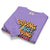 Folded purple sweatshirt with colorful text design on a white background