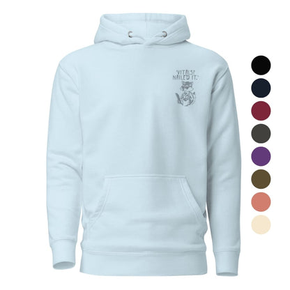 Raccoon nurse graphic wearing scrubs and sunglasses holding a clipboard under the quote “Vitals? Nailed It.” – printed on a black Cotton Heritage hoodie