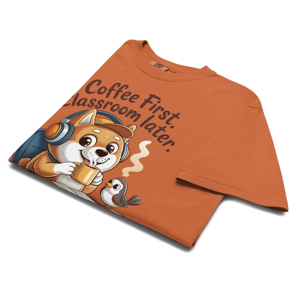 Orange t-shirt with a cartoon dog and text on a white background