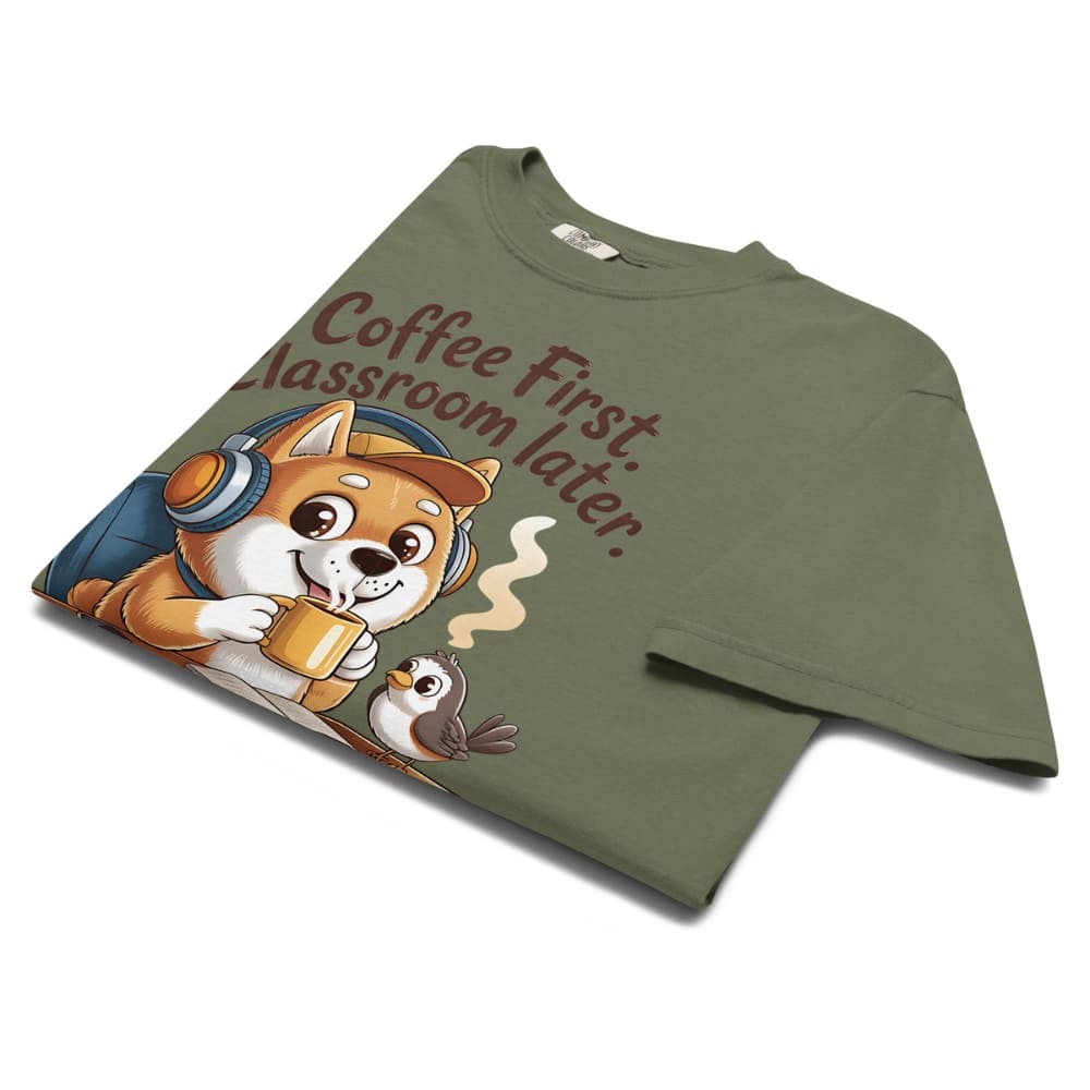 Green t-shirt with a cartoon dog and text 'Coffee First, Classroom Later' on a white background