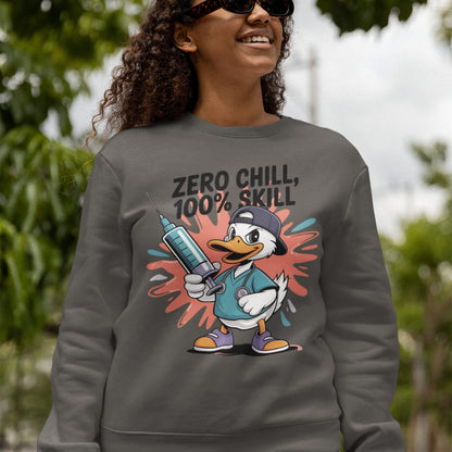 Person wearing a gray sweatshirt with a cartoon duck design and text outdoors.