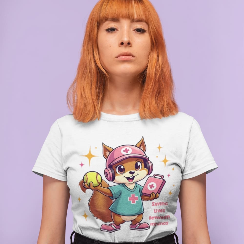 Cute squirrel nurse cartoon in scrubs, pink cap, and headset holding a softball and medical kit with the phrase “Saving Lives Between Innings” — printed on a heavyweight cotton t-shirt