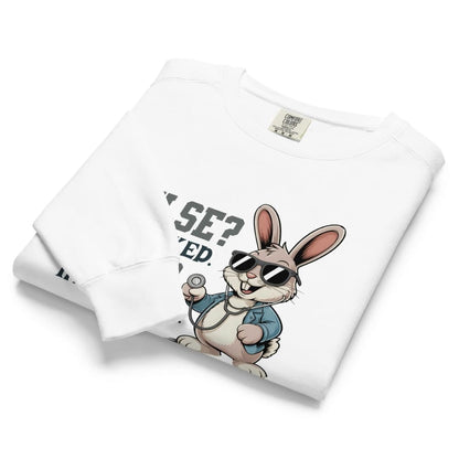 White t-shirt with cartoon rabbit design and text on a white background