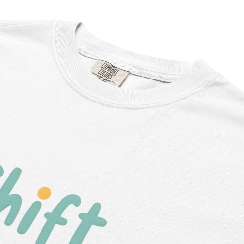 “Shift Happens – Nurse Edition” pastel text design printed on a thick garment-dyed cotton t-shirt, perfect for nurses and healthcare professionals with a sense of humor.