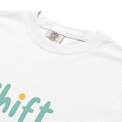 “Shift Happens – Nurse Edition” pastel text design printed on a thick garment-dyed cotton t-shirt, perfect for nurses and healthcare professionals with a sense of humor.