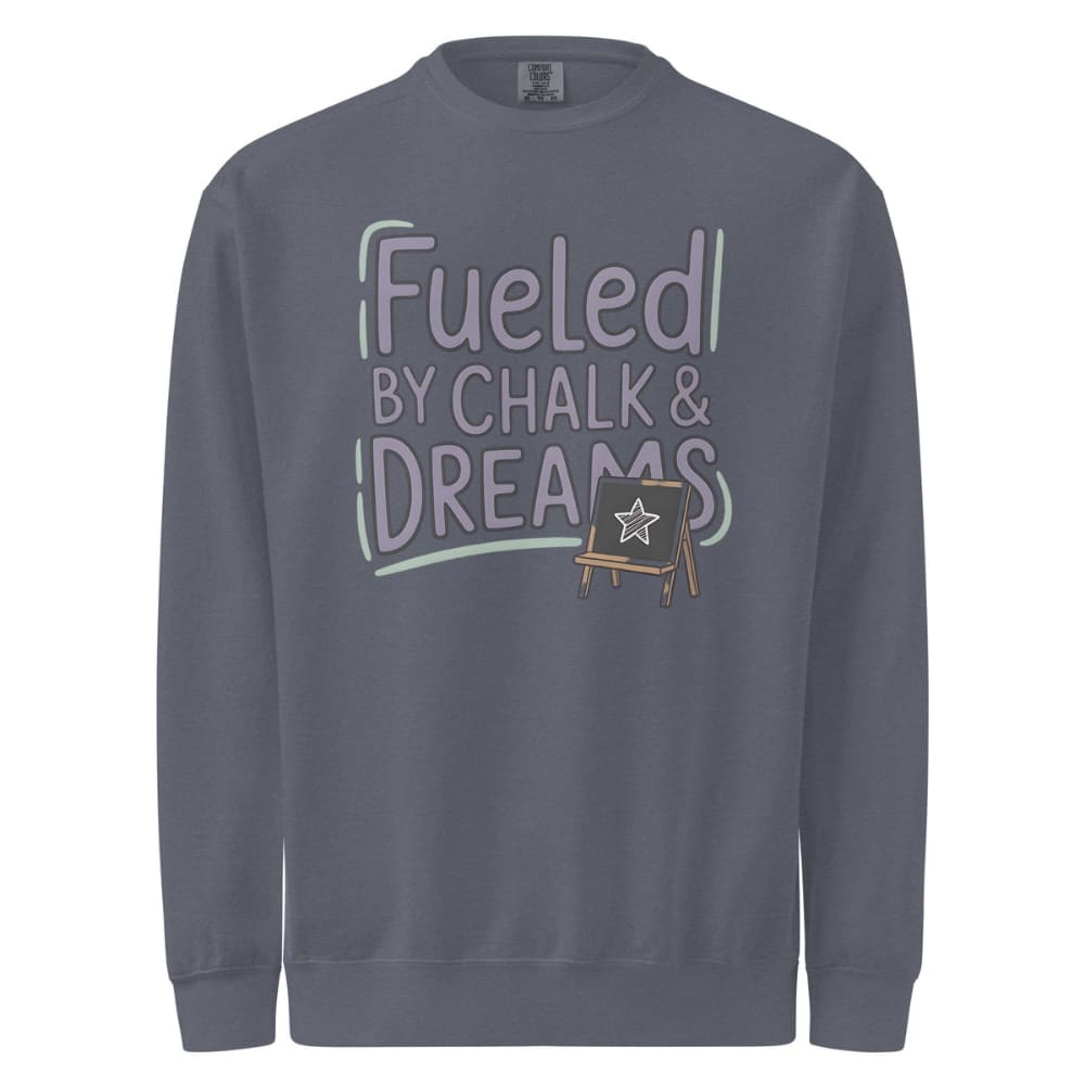 Fueled by Chalk & Dreams printed design on a vintage-style garment-dyed sweatshirt with chalkboard illustration – soft fleece ideal for teachers