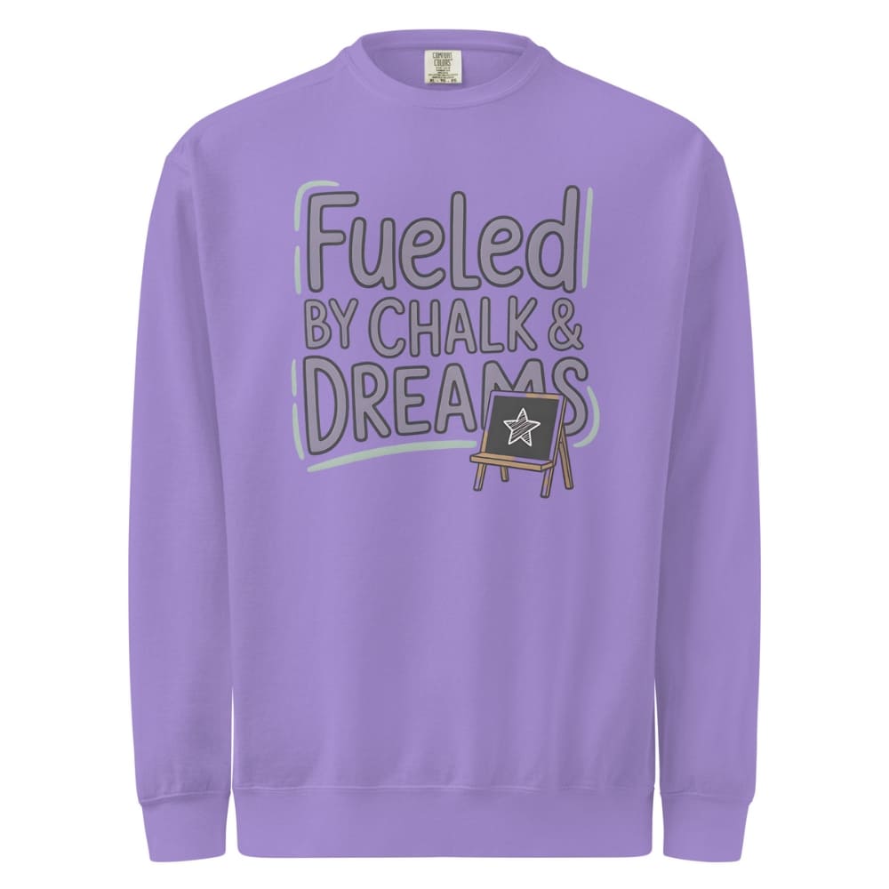 Fueled by Chalk & Dreams printed design on a vintage-style garment-dyed sweatshirt with chalkboard illustration – soft fleece ideal for teachers