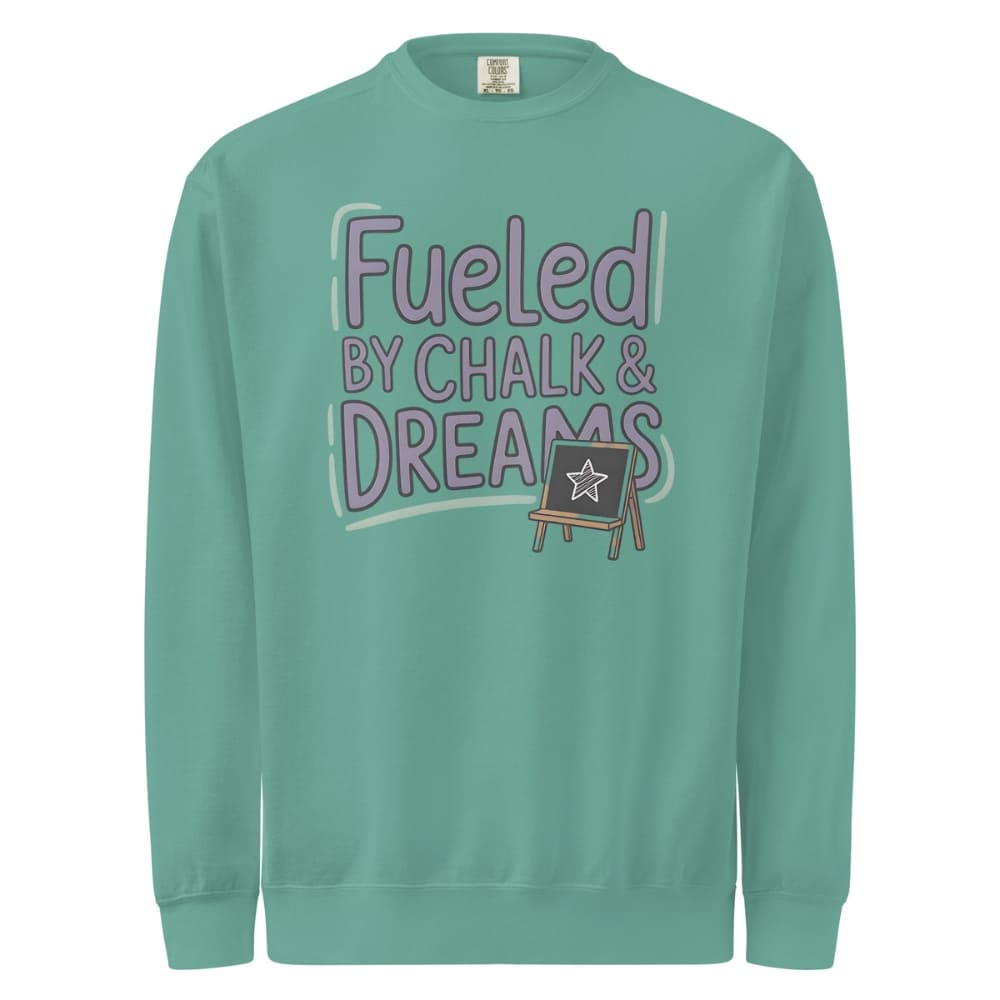 Fueled by Chalk & Dreams printed design on a vintage-style garment-dyed sweatshirt with chalkboard illustration – soft fleece ideal for teachers