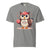 Cute cartoon owl cheerleader holding a pom-pom and clipboard, wearing a red cap with the quote “Behind Every Great Swing Is a Loud Mom” – featured on garment-dyed heavyweight cotton tee