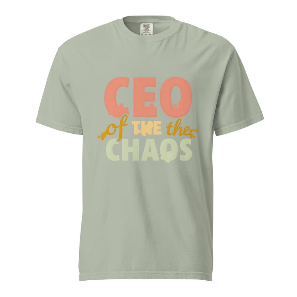 CEO of the Chaos” printed on a heavyweight cotton t-shirt in soft pastel ink, laid flat with a minimal lifestyle background.