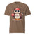 Cute cartoon owl cheerleader holding a pom-pom and clipboard, wearing a red cap with the quote “Behind Every Great Swing Is a Loud Mom” – featured on garment-dyed heavyweight cotton tee