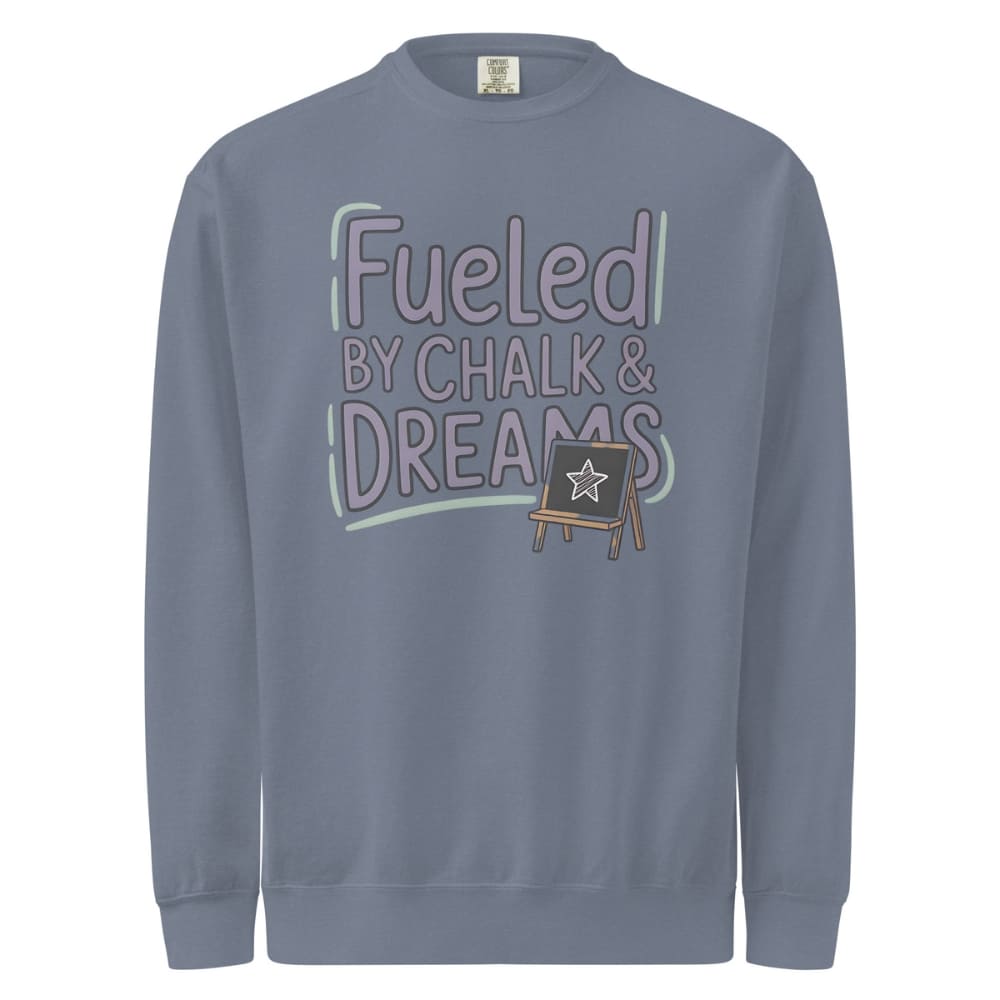 Fueled by Chalk & Dreams printed design on a vintage-style garment-dyed sweatshirt with chalkboard illustration – soft fleece ideal for teachers