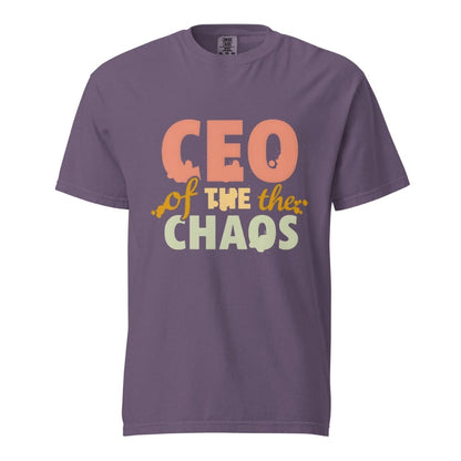 CEO of the Chaos” printed on a heavyweight cotton t-shirt in soft pastel ink, laid flat with a minimal lifestyle background.