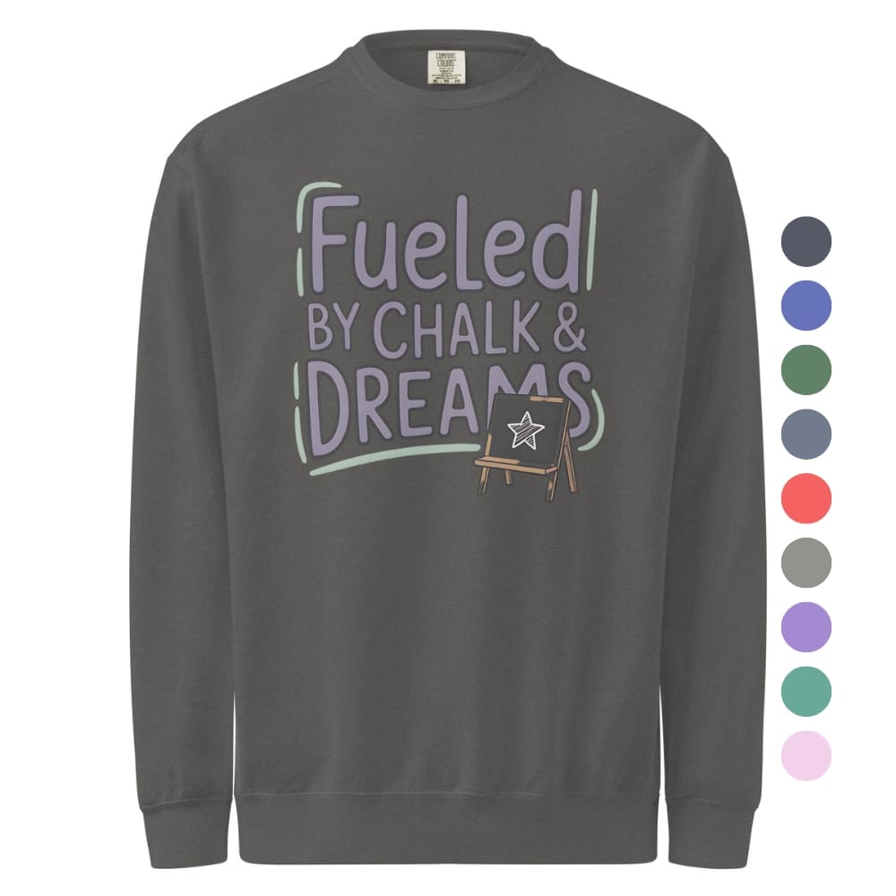 Fueled by Chalk & Dreams printed design on a vintage-style garment-dyed sweatshirt with chalkboard illustration – soft fleece ideal for teachers