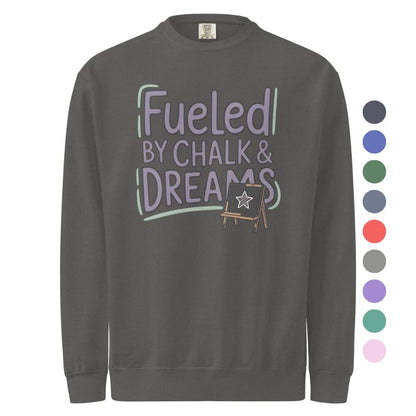 Fueled by Chalk & Dreams printed design on a vintage-style garment-dyed sweatshirt with chalkboard illustration – soft fleece ideal for teachers